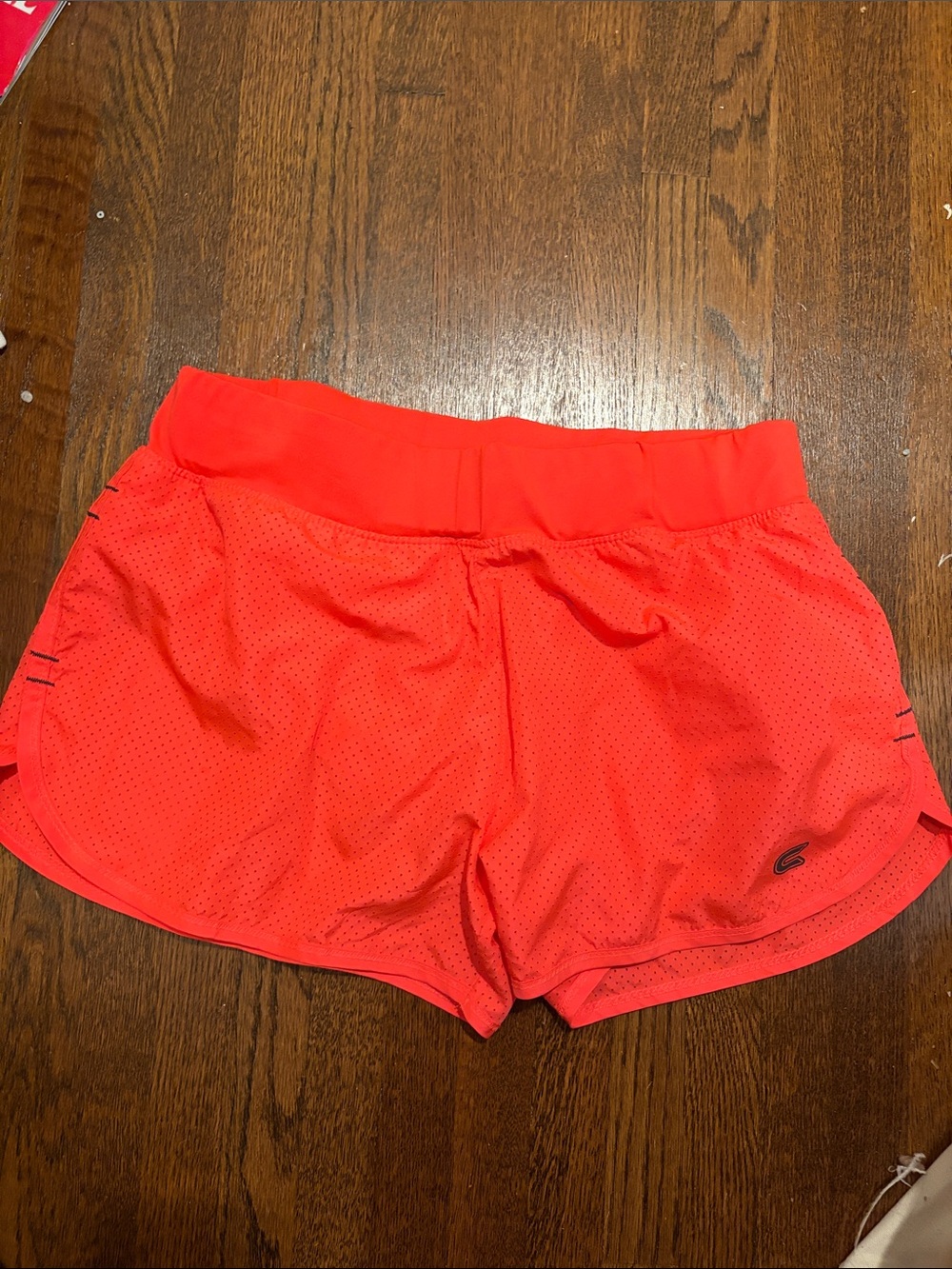 Women's Athletic Perforated Shorts in Coral